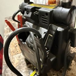 Battery Charger  And Air Compresser Also Charges Phone 