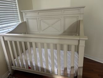 Mathis Brothers Cribs.