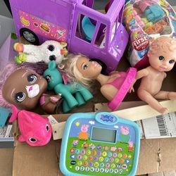 Assorted girl, toys, and books
