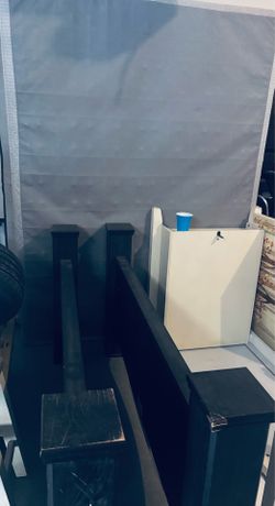 Black wood queen size bed with the mattresses