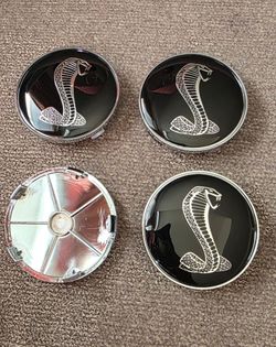 60mm or 68mm Mustang Shelby Cobra Snake center caps see all pictures sold separately SHIPPING is also AVAILABLE