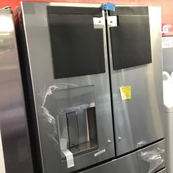 New Scratch and Dent GE Cafe 28.2 Cu Ft Stainless Steel 4 Door Fridge. 1 Year Warranty 