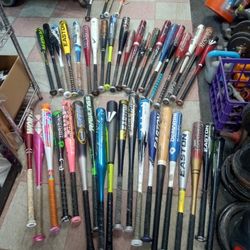 Baseball - Softball -Tball bats --) 30" and above are $20 / 29" and under are $15 each
