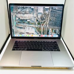 Apple MacBook Pro 15” 2018 2.2Ghz 6-Core i7 32GB ram 256GB Radeon Pro 555X 4GB VRAM Graphics