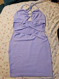 Size XL, stretchy mini dress, with crossing underbust straps in the front, and crossing shoulder straps in the back.