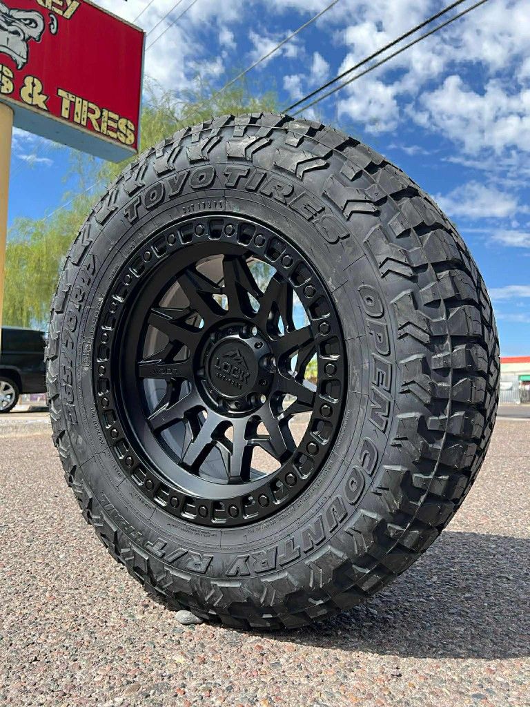 17x9 Lock Off-Road Wheels And Tires 265/70/17 Toyo RT