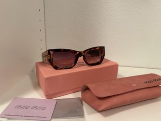 miumiu women’s Sunglasses MU 09WS