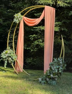Crescent moon shaped wedding arch
