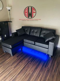 Black sectional sofa couch with LED lights 