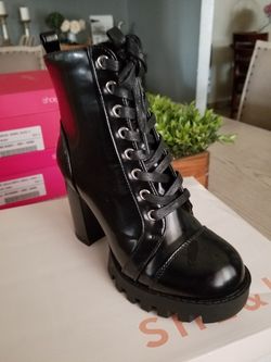 Brand new black booties