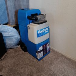 The Bag Hanging  From Rug Doctor Is Pipe And Extras For Upholstery  Cleani