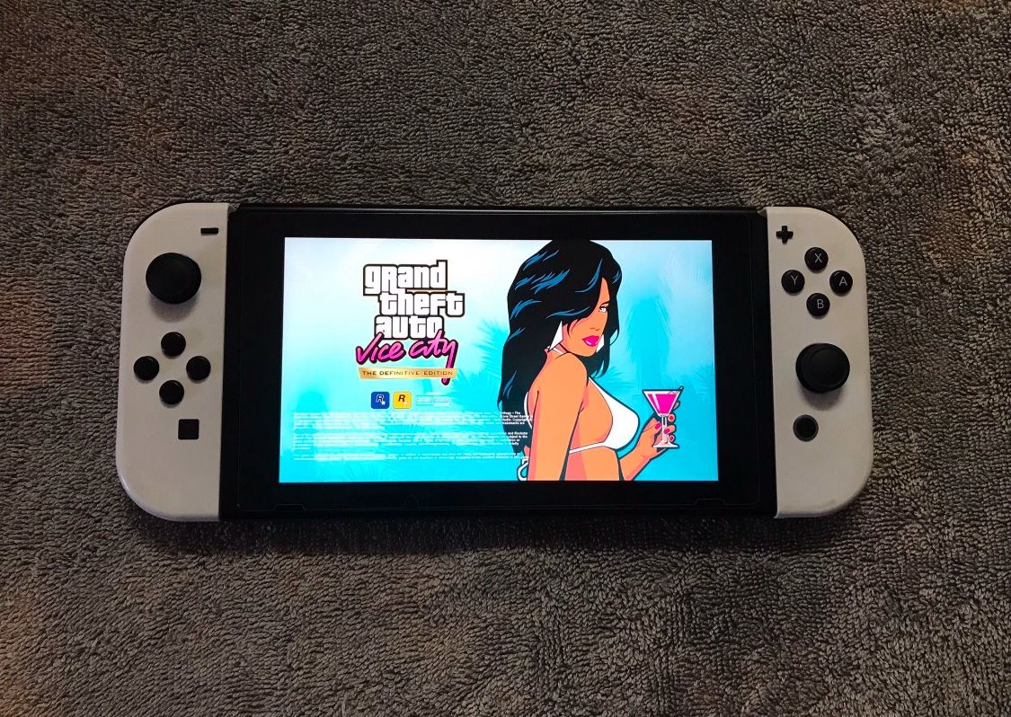 NINTENDO SWITCH V2 with 125 SWITCH GAMES