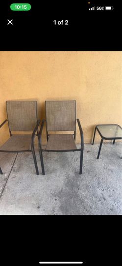 Two Chairs And A Table 