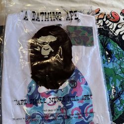 white and blue bape tee 