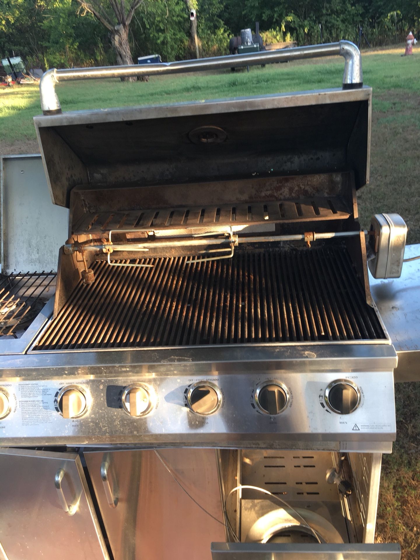 Stainless steel Ducane gas grill with rotisserie