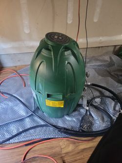 Green Coleman inflatable hot tub pump working