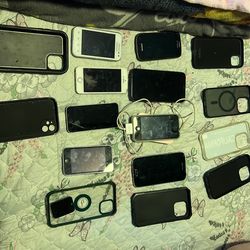 Lot of iPhones there from 4s-5-se-11 some locked for parts only the 11 works just the back part is broken