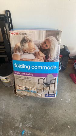 Folding commode never used.