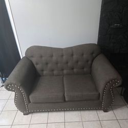 Grayish Brown Velvet Upholstered Tufted Sofas (a 2 seater and a 3 seater)