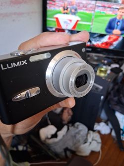 Panasonic Lumix DMC-FX3 digital camera working.  Missing charger