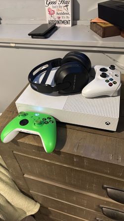 Xbox 1 with headphones and controller