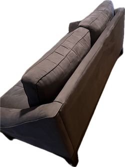 Gray Upholstered Sofa with Tufted Back