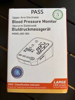 Brand new : blood pressure monitor