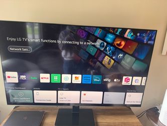 Thin 4K Ultra Resolution 60” Smart TV with mount
