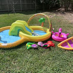 Outdoor Inflatable Kiddie Pool and Play Center with Slide, pump and floaties