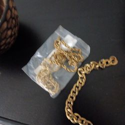 gold girls bracelet and broken neck