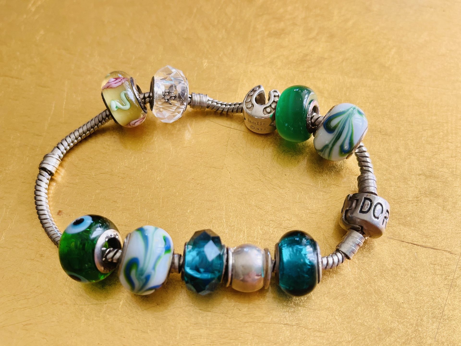 Pandora Sterling Plus 10 Sterling And Glass Beads And Charms