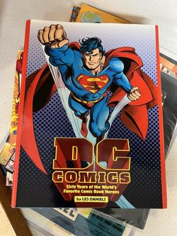 Comics: Sixty Years of the World's Favorite Comic Book Heroes by Les Daniels. $5