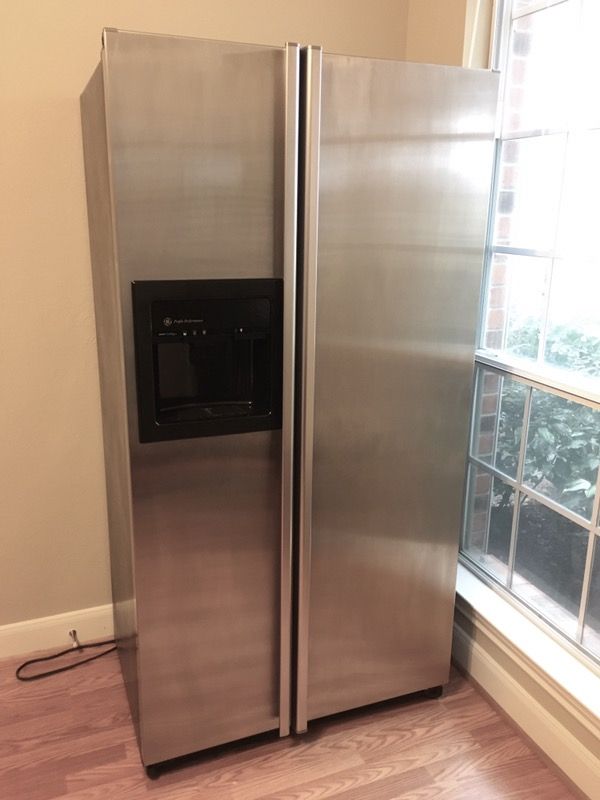GE stainless steel Fridge 23.7 CU. FT. M SIDE BY SIDE With DISPENSER AND WATER BY CULLIGAN for Sale in Katy TX OfferUp