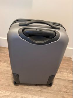 Grey Delsey Travel Suitcase