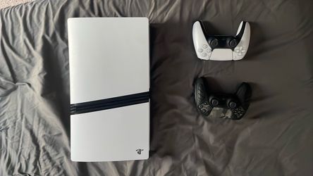 PlayStation 5 pro Console with Two Controllers