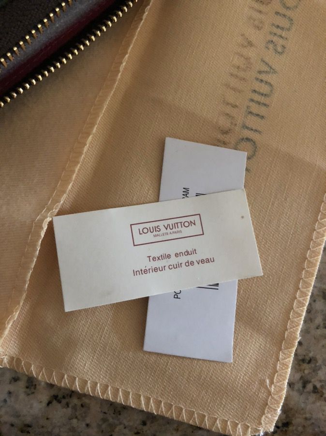 Louis Vuitton, a monogram leather 'Eugenie' wallet. - Bukowskis