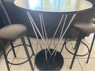 Bar table y taburetes