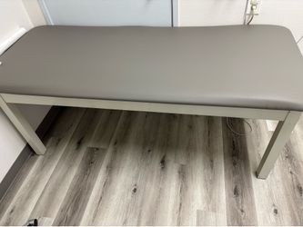 Medical exam table