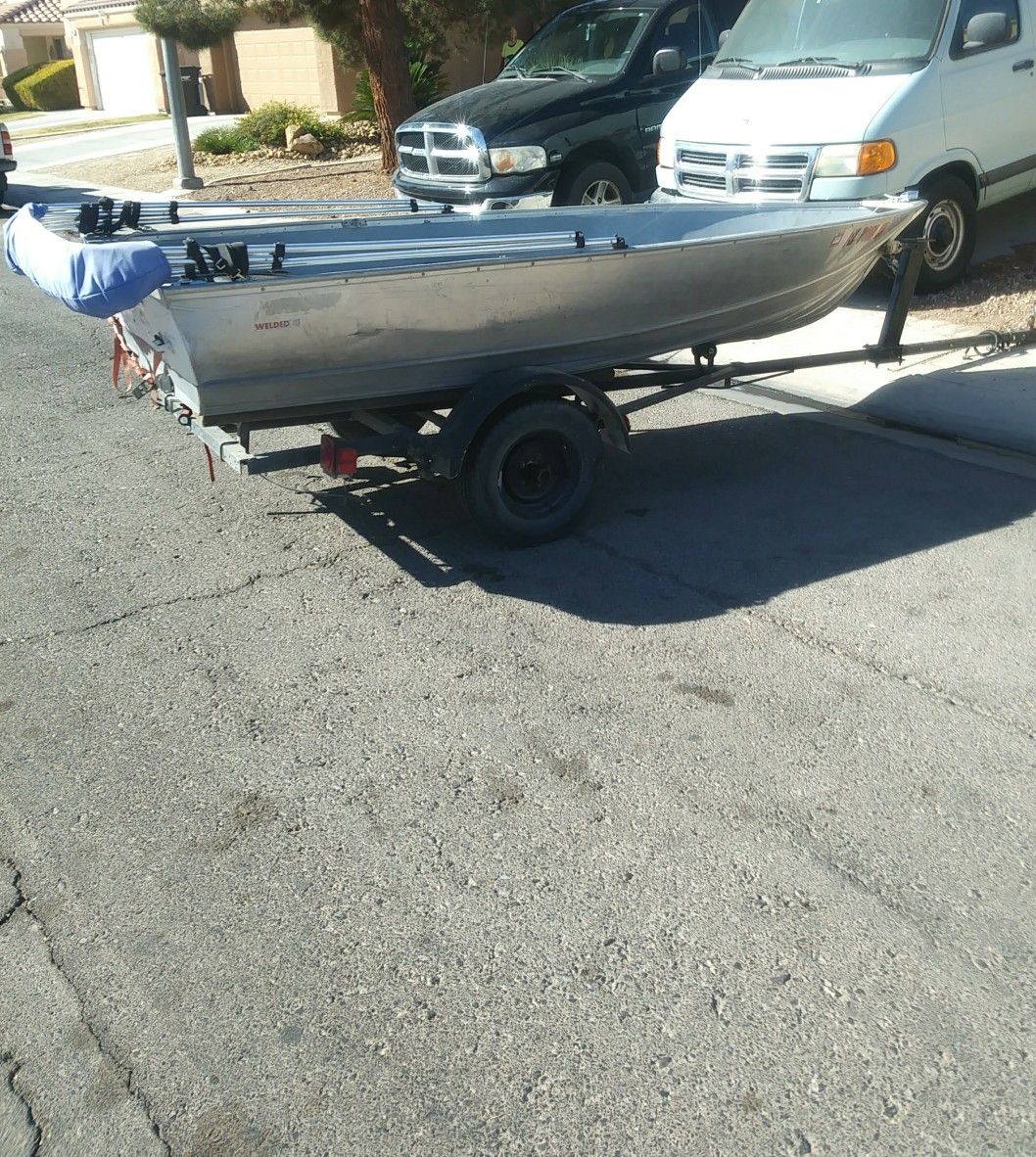 12 ft Aluminum Boat, Mercury Motor and Trailer