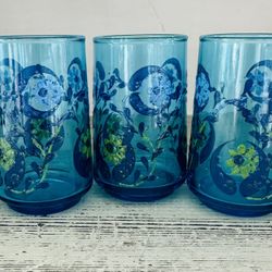  Set of 3 vintage Libbey 7 Oz. juice glasses. 3 7/8” tall  Aqua glass with blue and avocado green floral pattern that is raised and textured. 