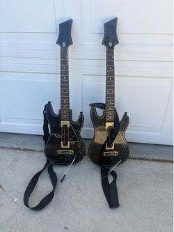 2 Guitar Hero wireless controllers