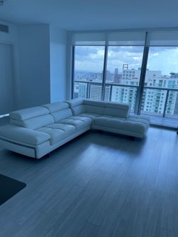 White Faux Leather Right-hand Facing Sofa & Chaise Sectional