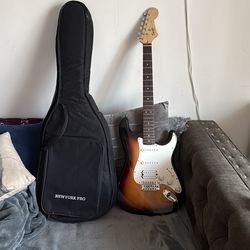 Squire, by Fender; butter star electric guitar.