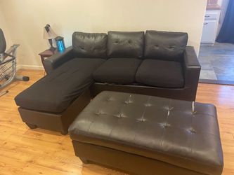 Faux leather couch with ottoman
