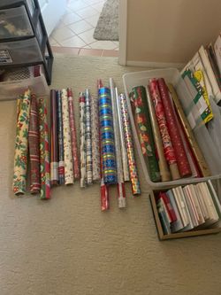 Gift wrap, tissue paper, bags, ribbons bows