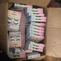 This is a Salon Perfect Vivid-HD 635 lash and dual-ended 2-in-1 liquid liner and lash adhesive in black and blue.    