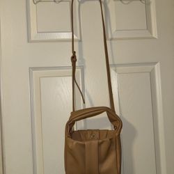 Tan and brown leather crossbody Purse bag with adjustable strap and zipper closure 
