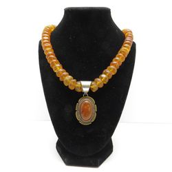 Amber necklace with sterling silver pendant Signed R. Bennett Navajo 