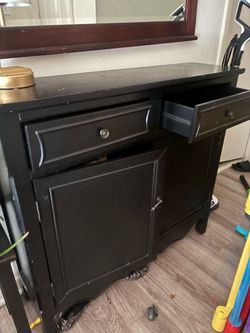 Narrow black entry cabinet