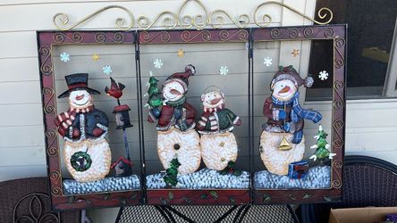 decorative trifold fireplace screen featuring a festive snowman Christmas scene